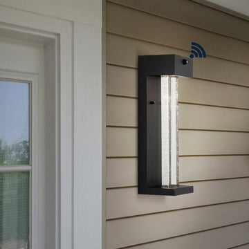 Miranda 5.13" Modern Industrial Iron/Glass Seeded Glass with Dusk-to-Dawn Sensor Integrated LED Outdoor Sconce - JONATHAN Y